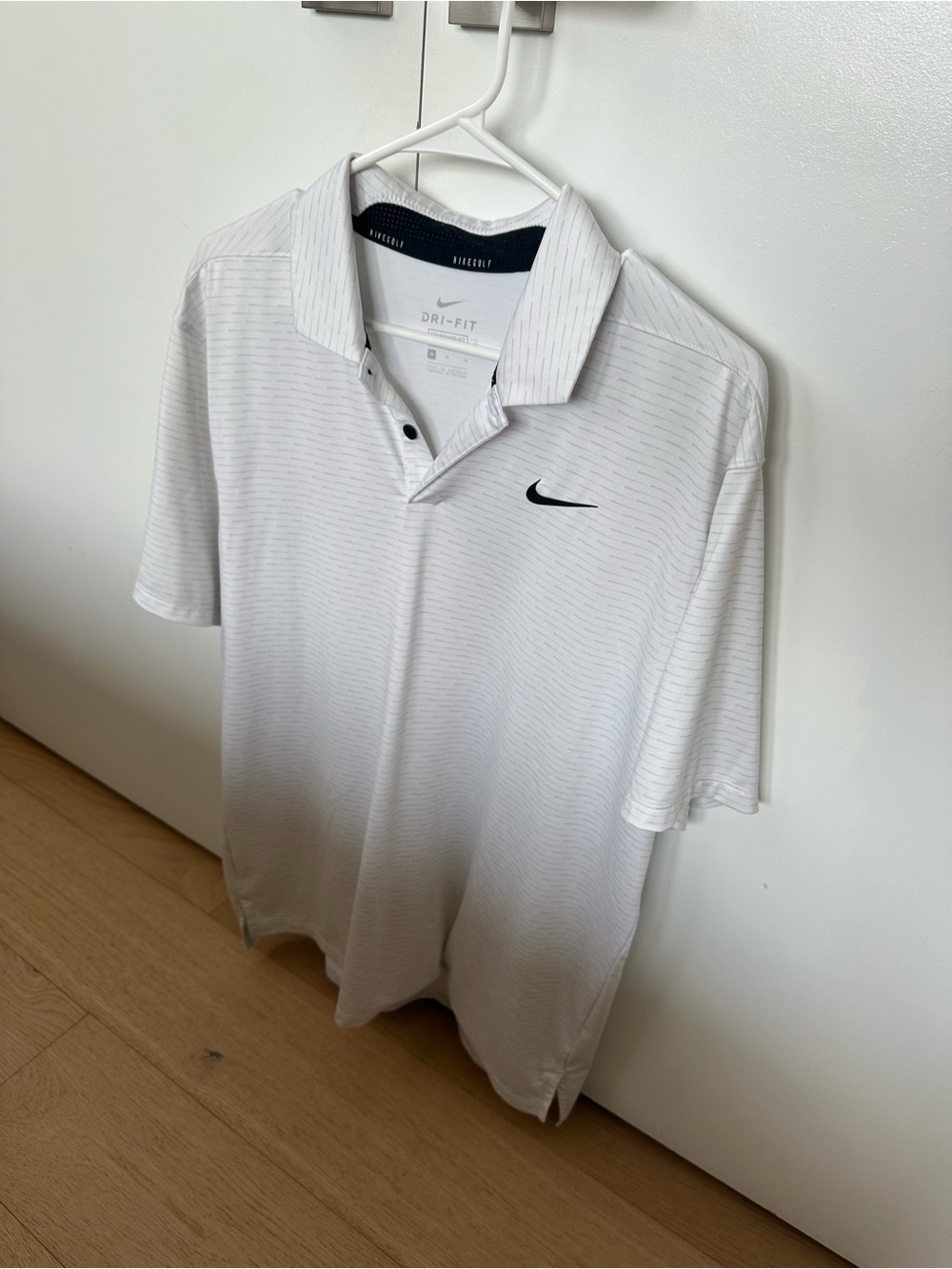 Nike White Men’s Dri-FIT Polo with Black Swoosh